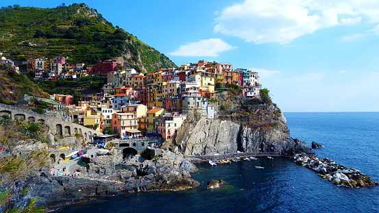 Manarola town, Cinque Terre national park, Liguria, Italy. Is one of five famous colorful fisherman villages, suspended between sea and land on sheer cliffs.