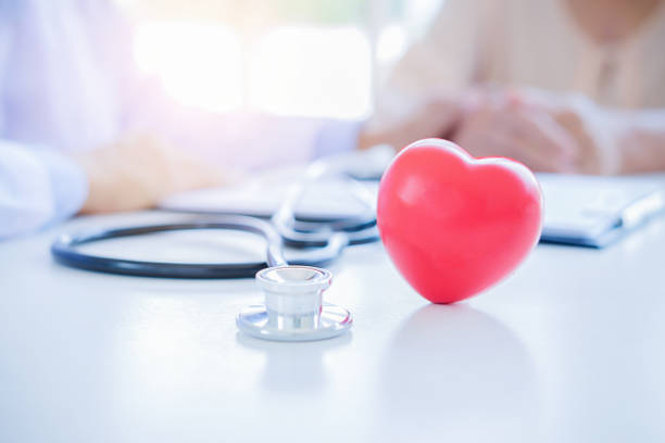 Red heart with stethoscope. Concept healthcare.