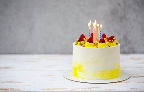 istock Beautiful happy birthday cake with mascarpone decorated with raspberry, pistachio 1136870861