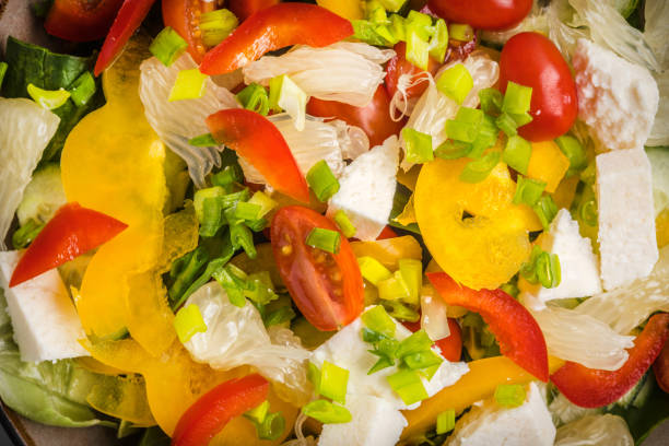 istock Salad with cheese and fresh vegetables. 1136872105