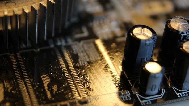 istock Close up of Electronic Circuits in Technology on Mainboard, system board or mobo. Computer motherboard, electronic components on circuits board, printed electronic board PCB 1136876538