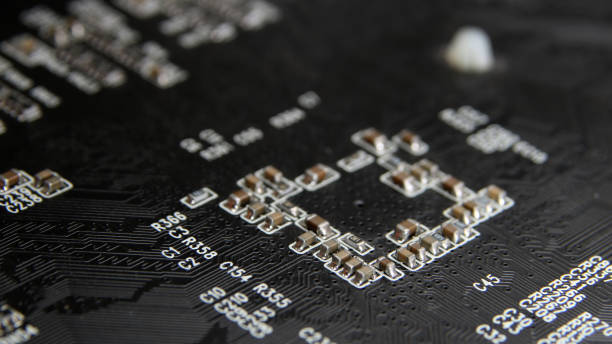 istock Close up of Electronic Circuits in Technology on Mainboard, system board or mobo. Computer motherboard, electronic components on circuits board, printed electronic board PCB 1136876577