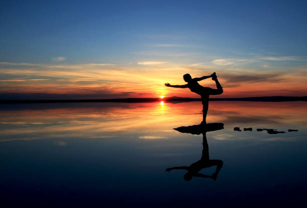 istock a women silhouette at sunset 1136877006