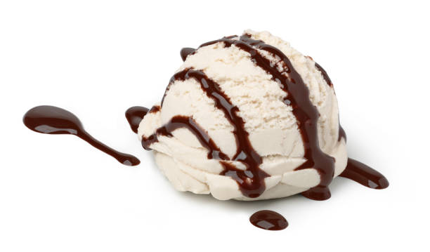 istock Vanilla ice cream scoop with chocolate sauce 1136883358