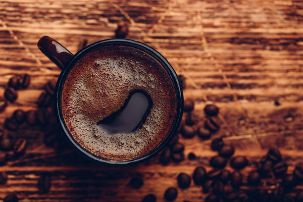 Brewed black coffee in metal mug