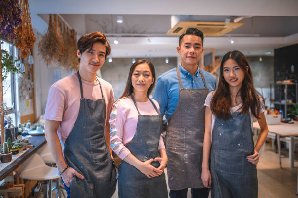 istock Confident business people standing in store 1136889937