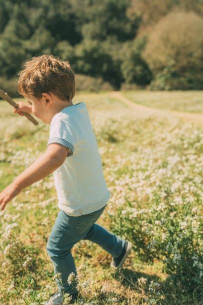 istock Brothers playing outdoors 1136890285