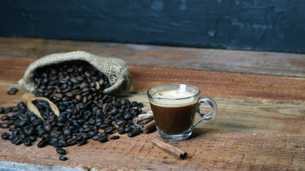istock Coffee cup with Coffee beans, burlap sack and with cinnamon sticks 1136891893