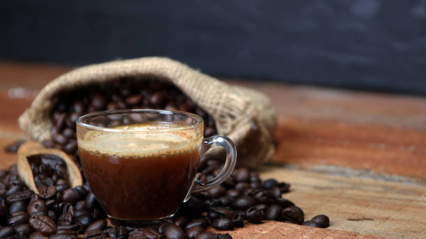 istock Coffee cup with Coffee beans, burlap sack and with cinnamon sticks 1136891903