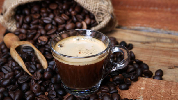 istock Coffee cup with Coffee beans, burlap sack and with cinnamon sticks 1136891927
