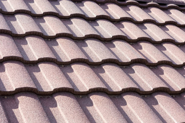 istock new brown roof tile close up. background texture. hight contrast. 1136892432