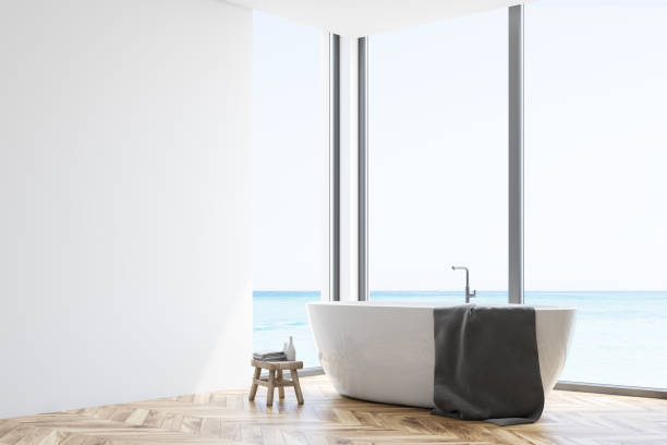 istock White bathroom corner with tub 1136895266