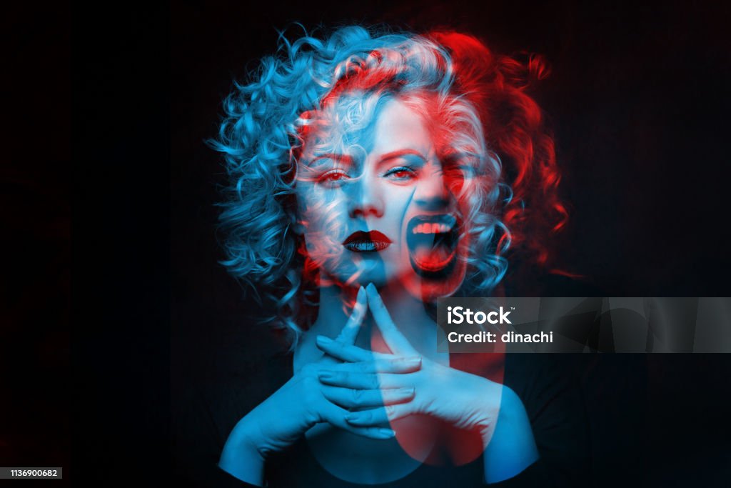 Calm and angry girl. Double color exposure. Multiple Exposure Stock Photo