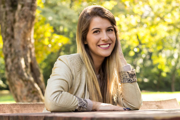 istock Woman sunny nature portrait 1136901822