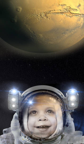 istock Child astronaut and the planet Mars 1136901883