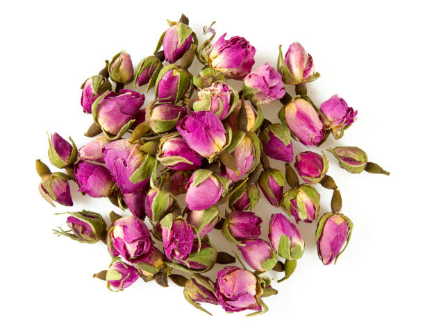 istock dry tea rose buds isolated on white 1136901941