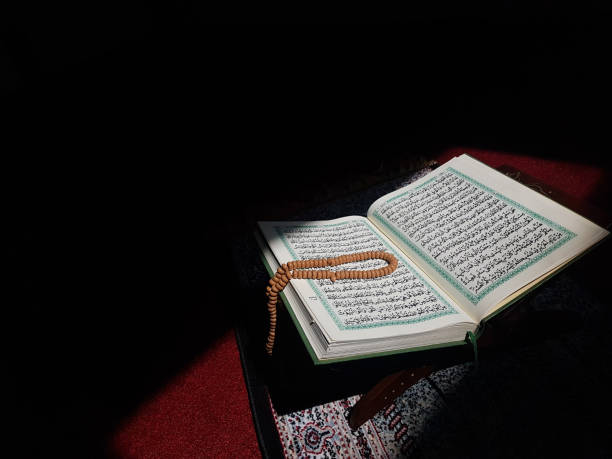 istock Quran Book In Focusing Light 1136903115