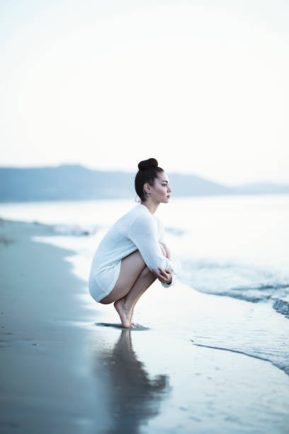 istock Beautiful young woman looking away alone 1136903949