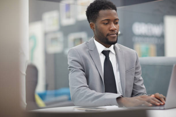 istock Successful African Businessman at Work 1136909119