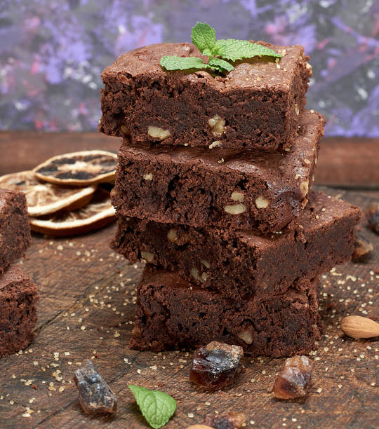 istock stack of baked square pieces of brownie pie 1136912276
