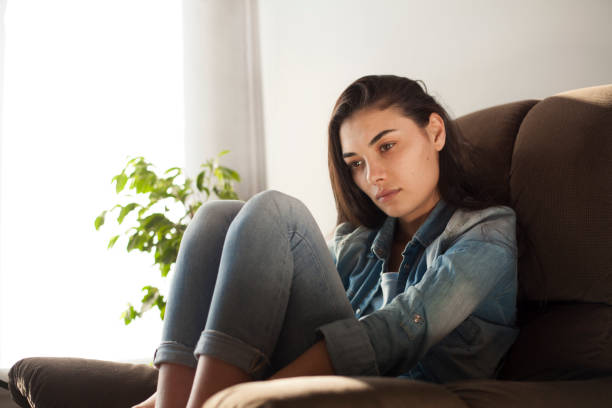 istock desperate woman thinking 1136915403