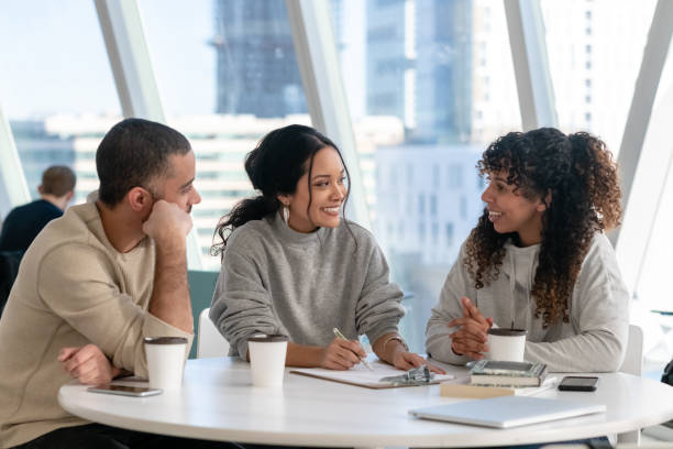 istock Afternoon meeting on university campus 1136917447