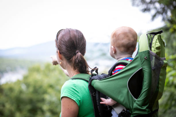 istock Mother Backpacking Hiking with Baby in Forest 1136924692