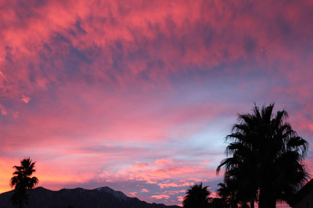 CATHEDRAL CATHARSIS - CATHEDRAL CITY - 013019 B In spite of the ever encroaching hammer of development, on special occasions, all in cathedral city are gifted with natural beauty cast by the San Jacinto Mountains sunset. sonoran desert stock pictures, royalty-free photos & images