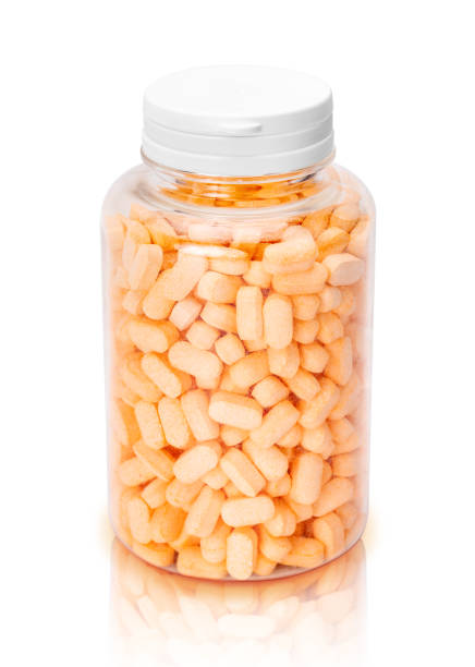 istock vitamin c tablets in transparent plastic bottle 1136926056