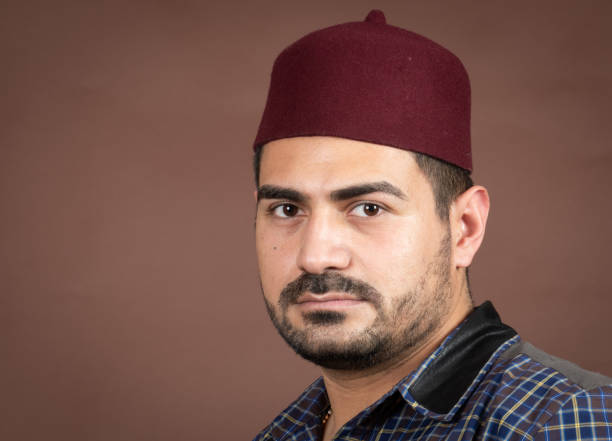 istock Serious mid adult man looking at the camera 1136929299