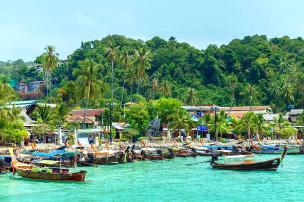 istock Beautiful Long beach with long tail boat, Phi Phi island, Thailand. 1136931990