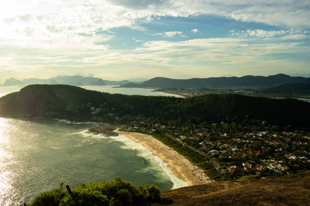 istock Sunset over the beach and city 1136934741