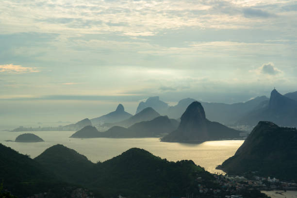 istock Hills, sea and sunset 1136934856