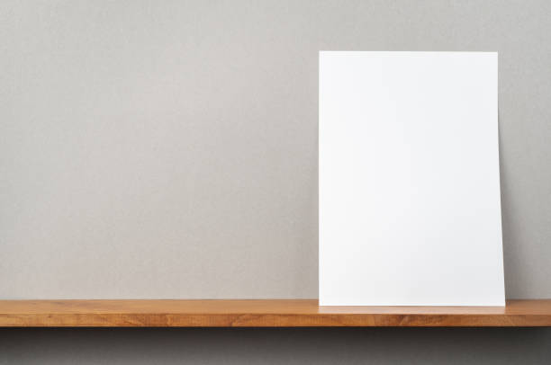 istock front view of A4 paper stand on bookshelf 1136939212