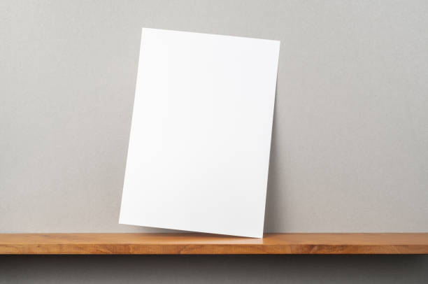 istock front view of A4 paper stand on bookshelf 1136939716