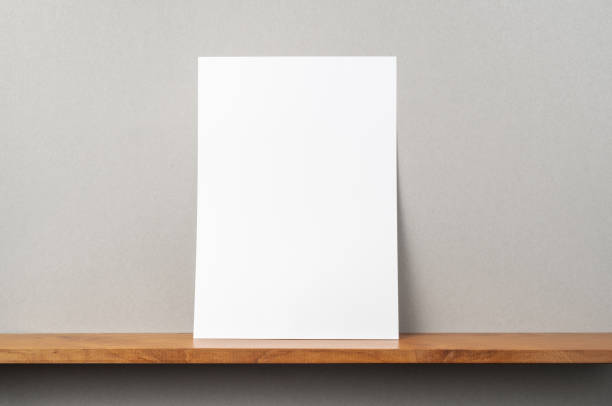 istock front view of A4 paper stand on bookshelf 1136939722