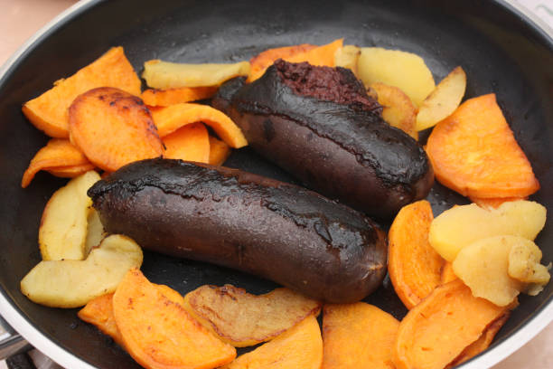 istock Black pudding cooked with sweet potatoes and apples 1136940976