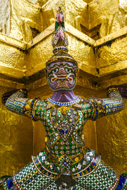 Giant in Tample This Giant has purple color. I belive his name is Miyalab. Miyalab is one of characters in clory of rama. Glory of rama is Thailand national's epic golden tample stock pictures, royalty-free photos & images