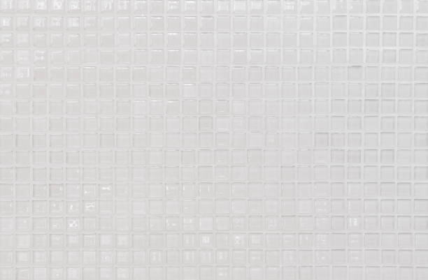 istock White and Grey the tile wall high resolution real photo or brick seamless and texture interior background. 1136945245