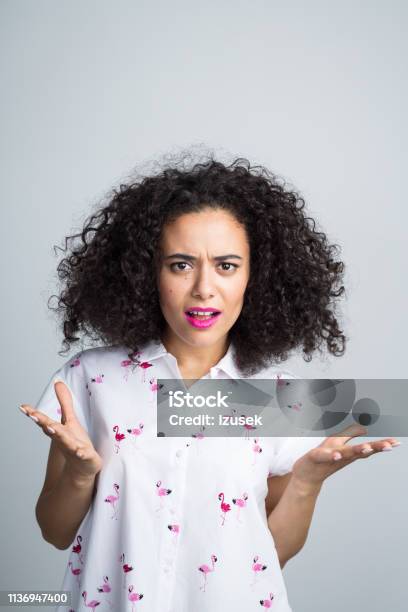 Woman Looking Really Annoyed Stock Photo - Download Image Now - 20-24 Years, Adult, Adults Only
