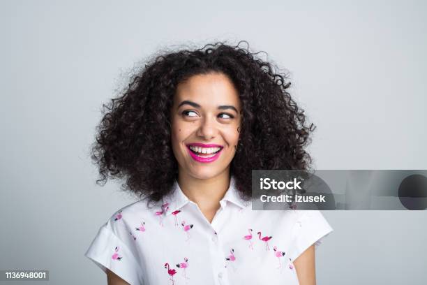 Smiling Woman Looking Away At Copy Space Stock Photo - Download Image Now - Women, One Woman Only, Asking