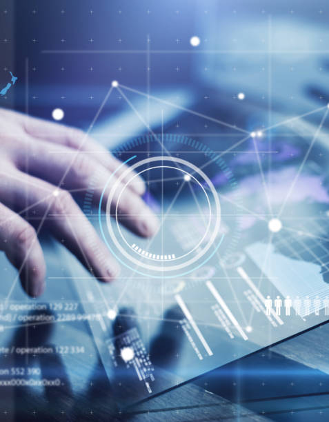 istock Man with futuristic digital tablet on a project 1136948325