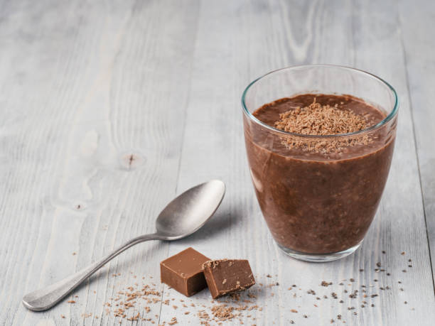 istock Chocolate chia pudding in glass on gray table 1136950490