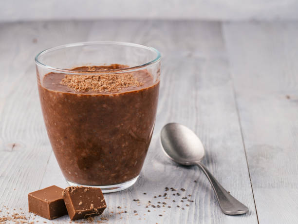 istock Chocolate chia pudding in glass on gray table 1136950509