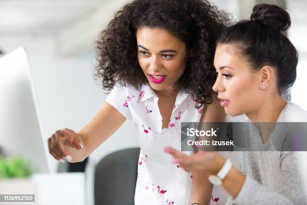 Software Developer Working Together Stock Photo - Download Image Now - Computer Monitor, Desk, Only Women