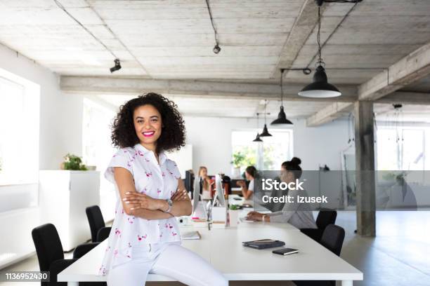 Confident Female Software Engineer In Modern Office Stock Photo - Download Image Now