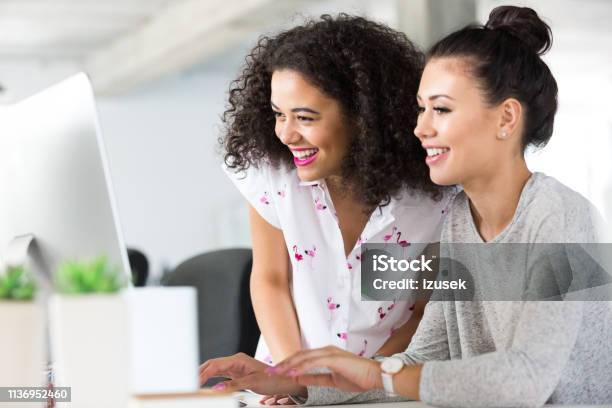 Computer Programmer Discussing New Coding Stock Photo - Download Image Now - IT Support, A Helping Hand, Adult