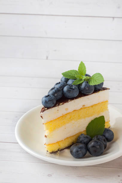Cake of a souffle with glaze and fresh blueberries