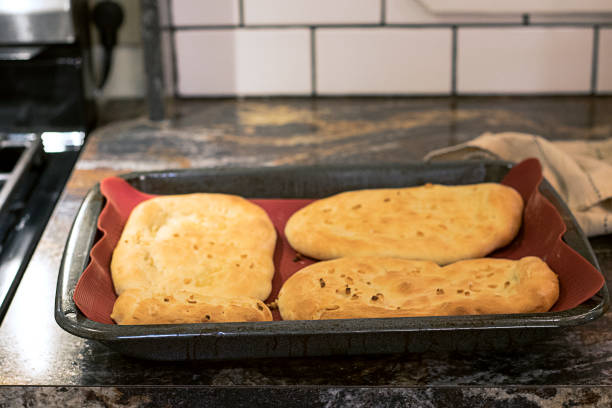 istock Naan bread cooling on the counter 1136956818