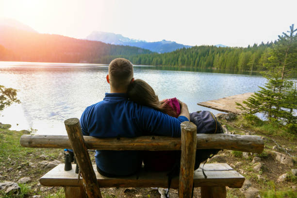 istock Romantic couple enjoying the sunset 1136961684